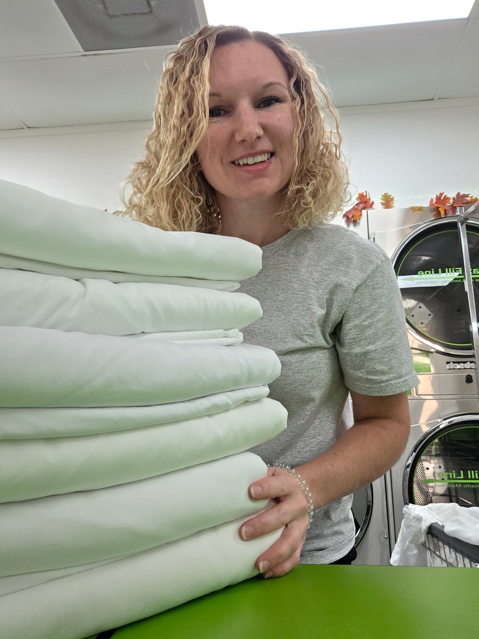 Freshly folded bedding at We Fold Laundromat in Hollywood, SC